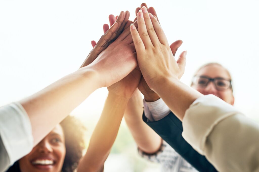 people and hands together up